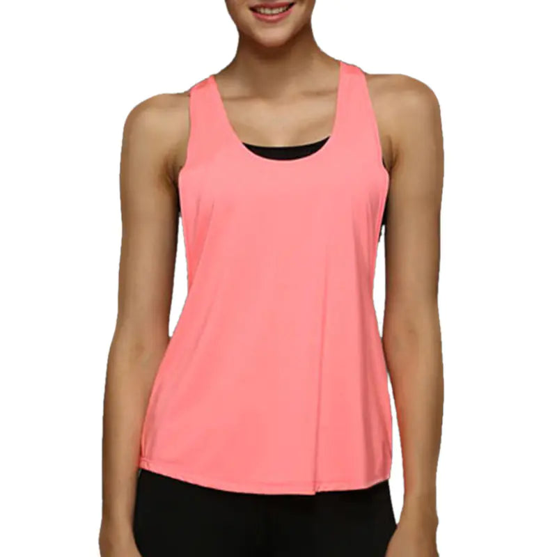 Person wearing a pink tank top on a white background