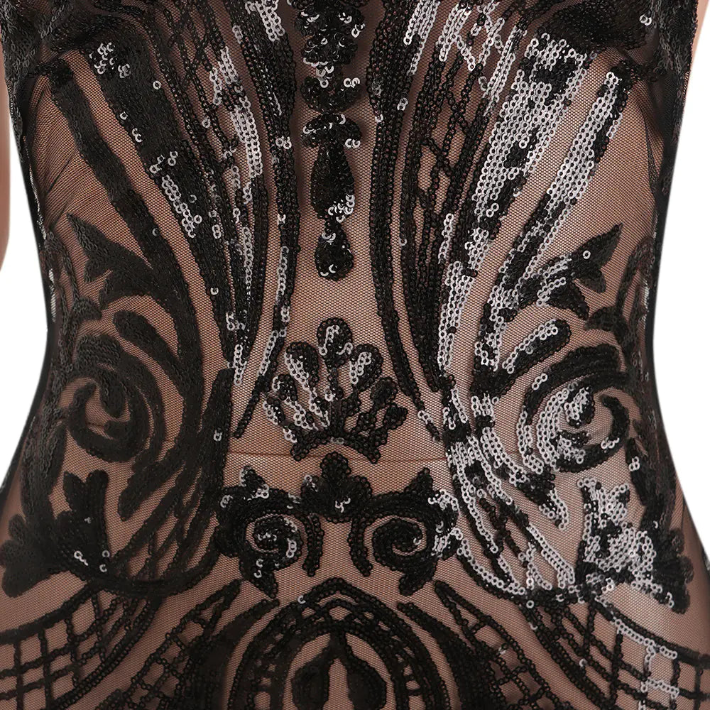 Close-up of a black lace garment with sequin embellishments, beautiful dress for night club 