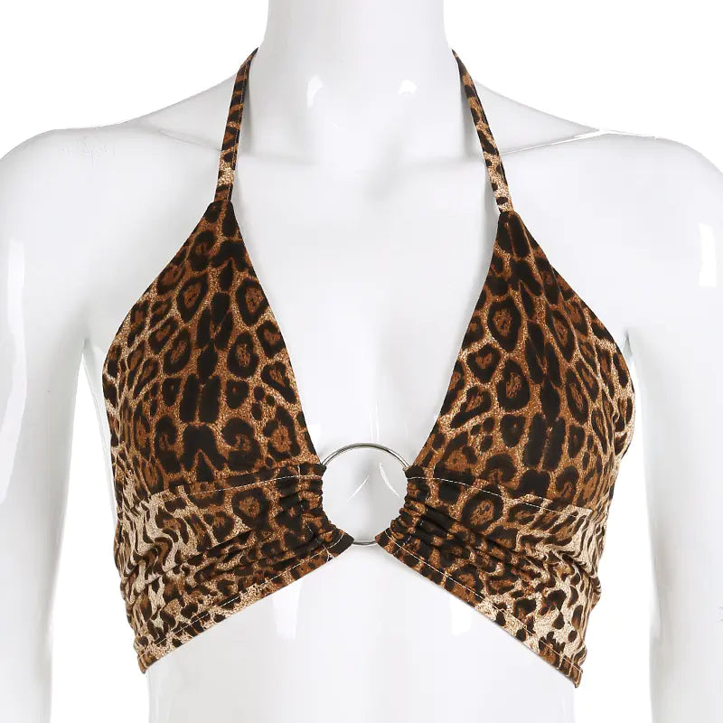 Leopard print halter top on a mannequin against a white background
