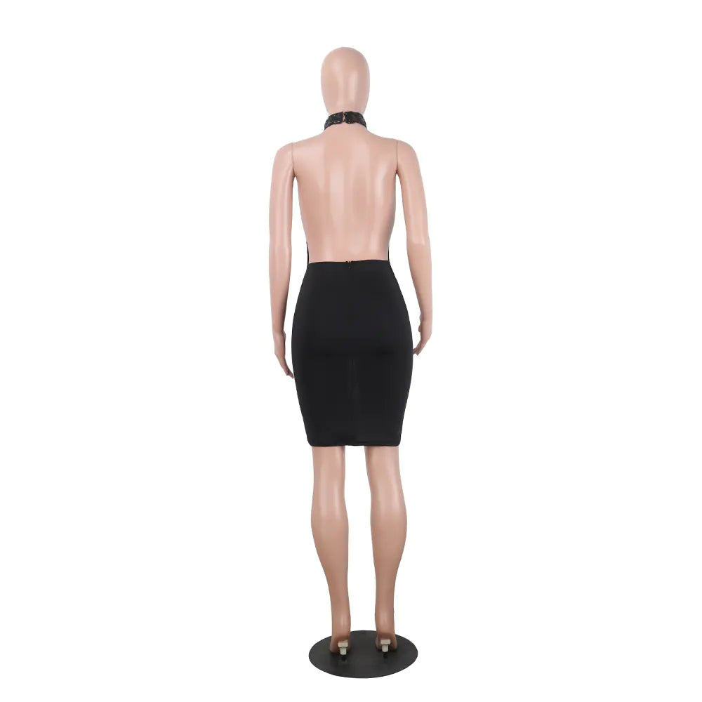 Mannequin wearing a black dress