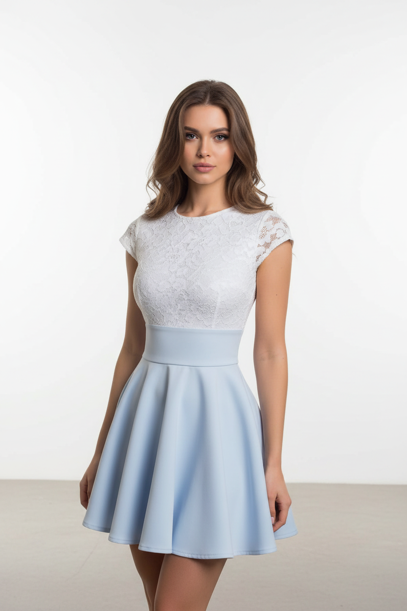 Woman wearing a white lace top and light blue skirt against a white background