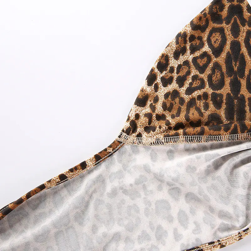 Close-up of leopard print fabric with a plain background