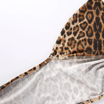 Close-up of leopard print fabric with a plain background