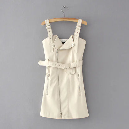Beige sleeveless dress with straps on a wooden hanger against a gray background