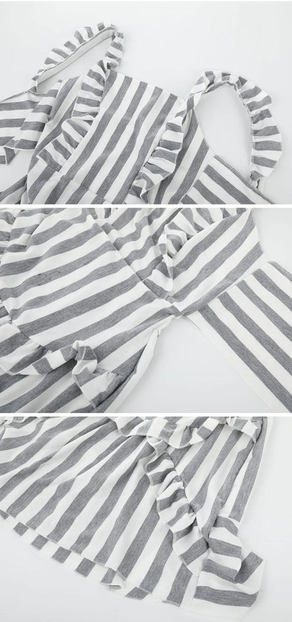 Gray and white striped dress with ruffled sleeves on a light gray background