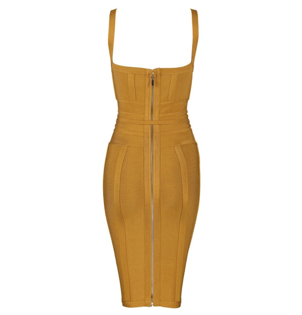 Mustard yellow dress with a zipper on a white background